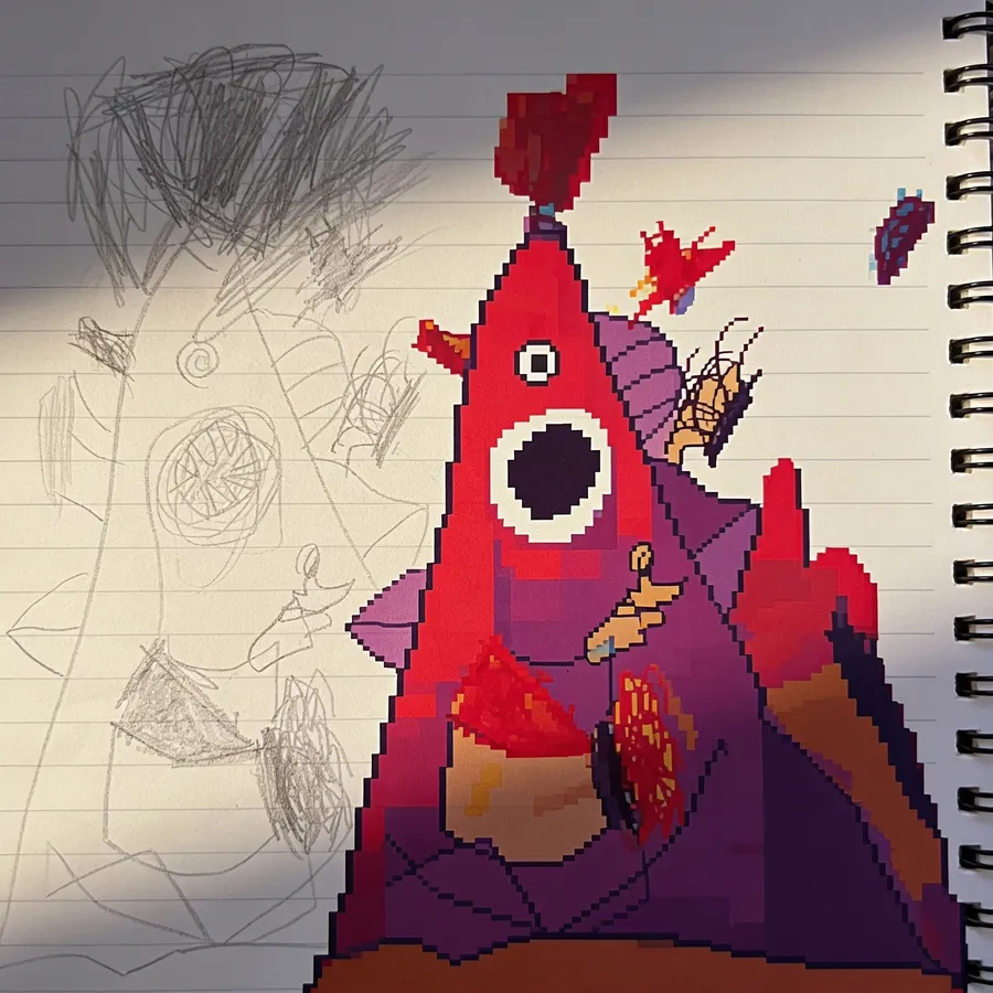 A boss sketch in the notebook next to its pixel-art version